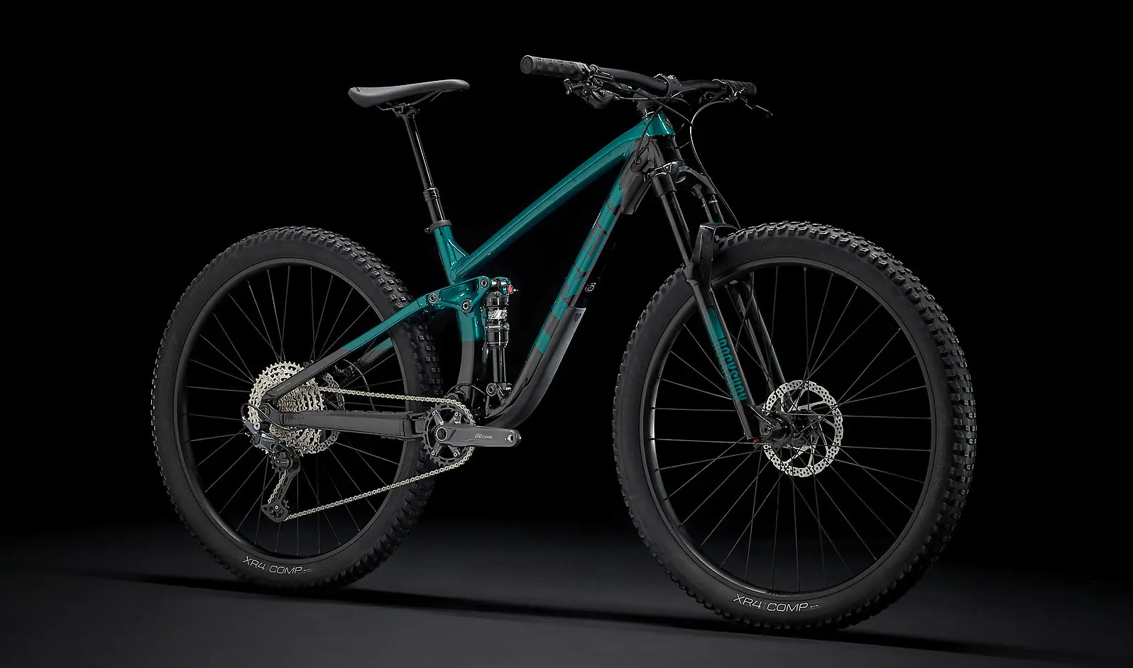 Trek Fuel EX 5 (Dark Aquatic-Trek Black) black background